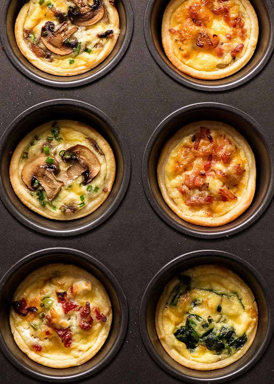 Mini quiche in muffin tin, fresh out of the oven. BEST finger food ever!