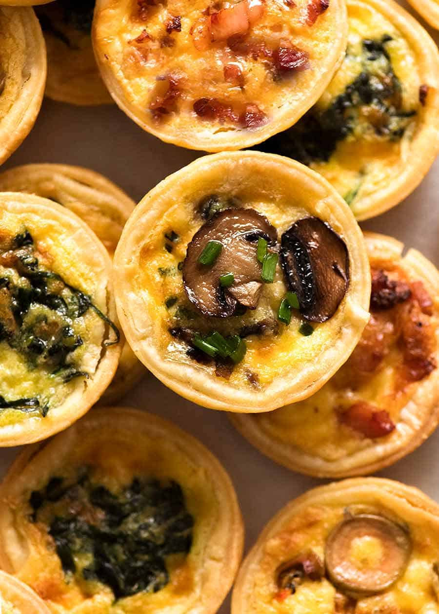 Overhead photo of mini quiches, ready to be eaten
