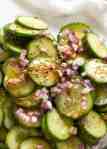 Close up of a refreshing Cucumber Salad with a tasty Herb & Garlic Dressing