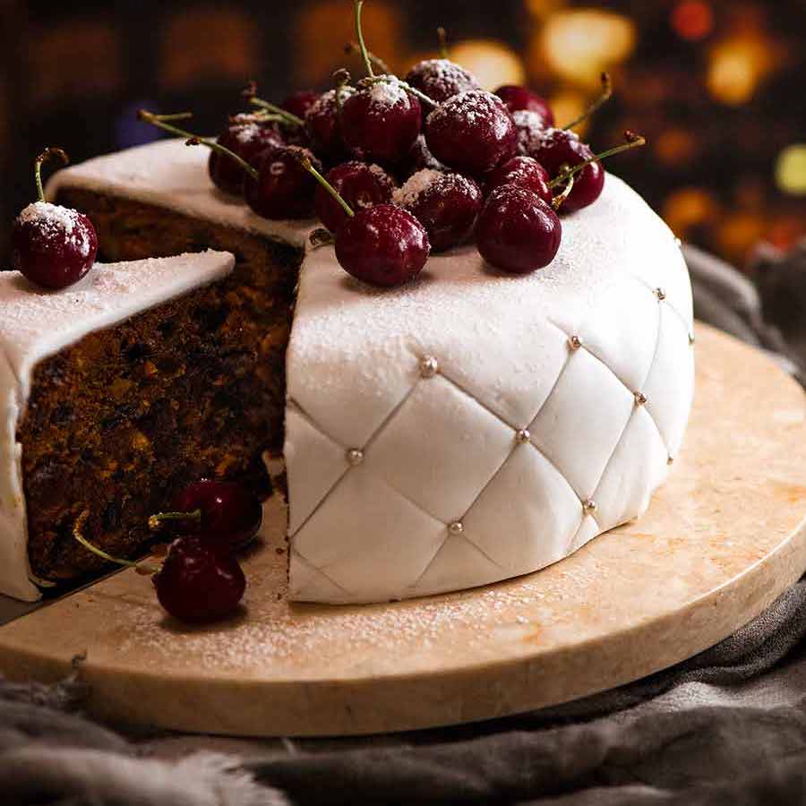 https://www.recipetineats.com/wp-content/uploads/2019/12/Christmas-Cake-decorated-with-fondant-marzipan-and-cherries-SQ.jpg