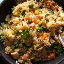Close up of Cauliflower Fried Rice in a bowl, ready to be eaten