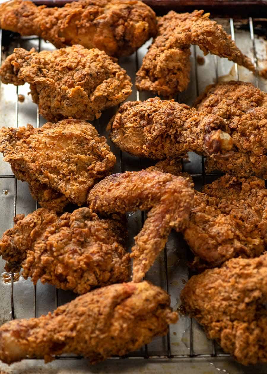 Fried Chicken on a tray being kept warm in the oven