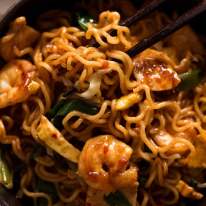 Close up of Mie Goreng in a bowl, ready to be eaten