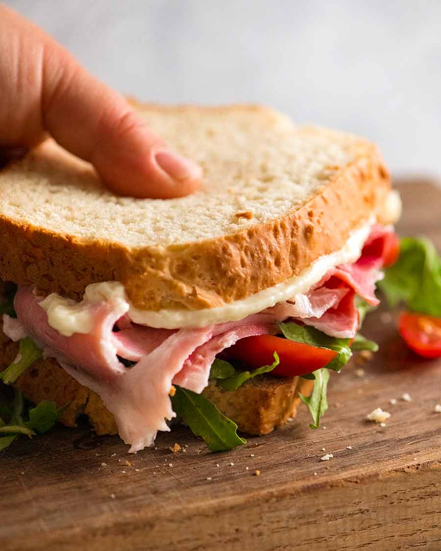 No yeast bread sandwich with ham, lettuce and tomato