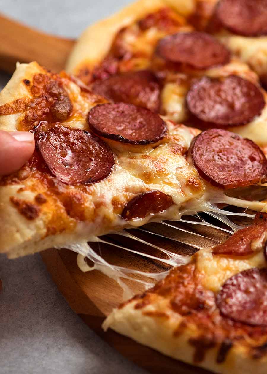 Close up of Homemade pizza dough recipe - pepperoni pizza