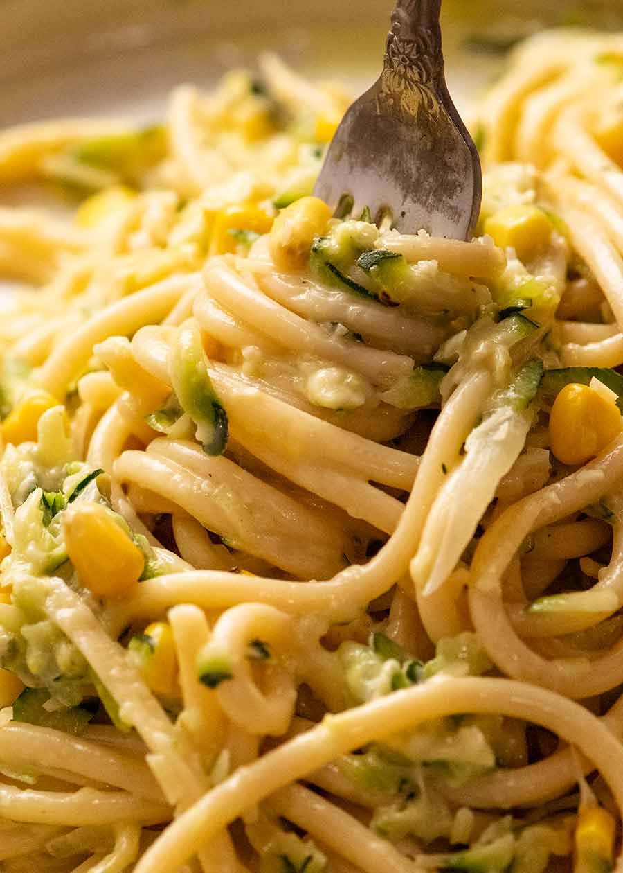 Fork twirling pasta with Creamy Zucchini Pasta Sauce (Courgette)