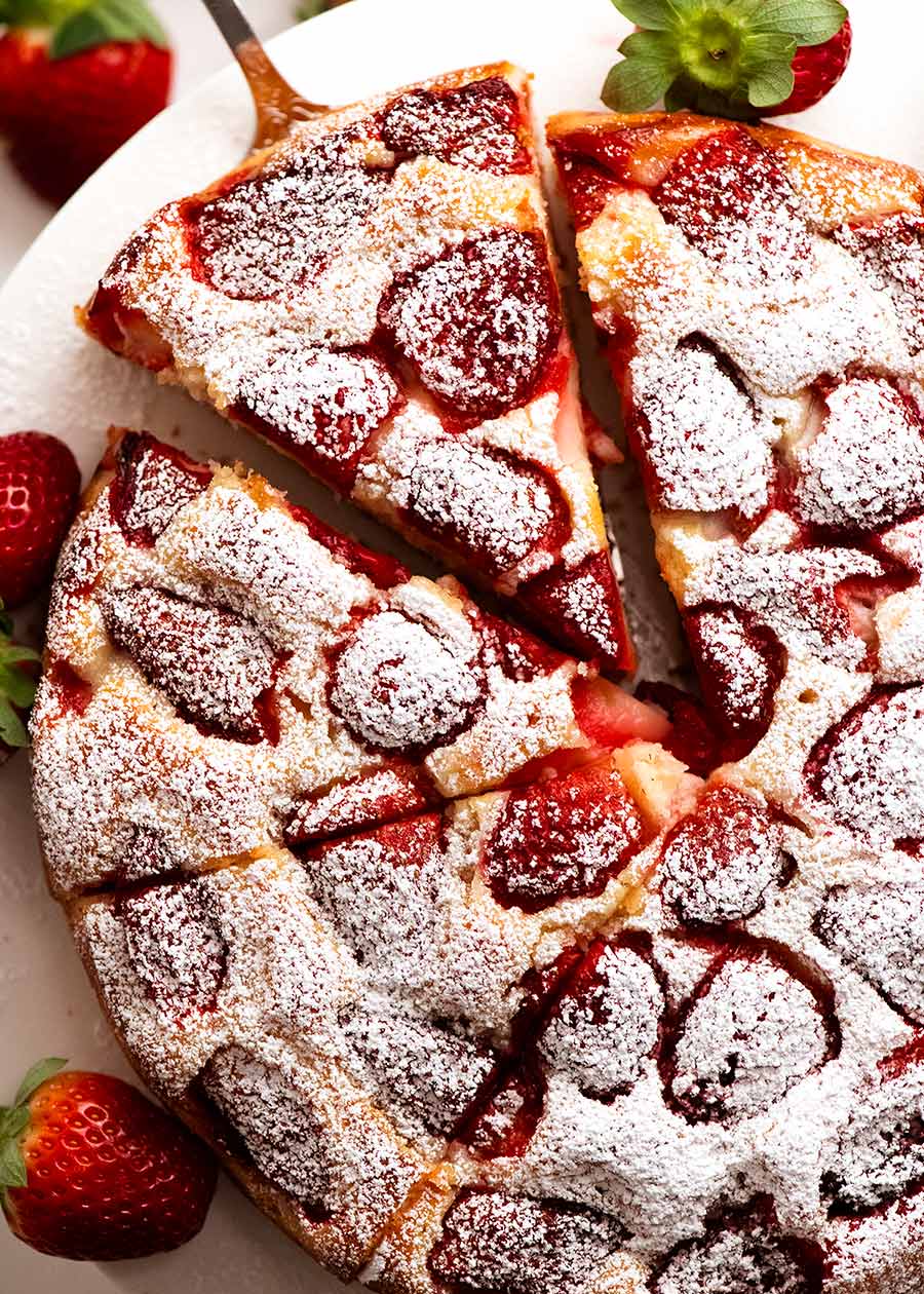 Overhead photo of Strawberry Cake dusted with icing sugar, ready to be served