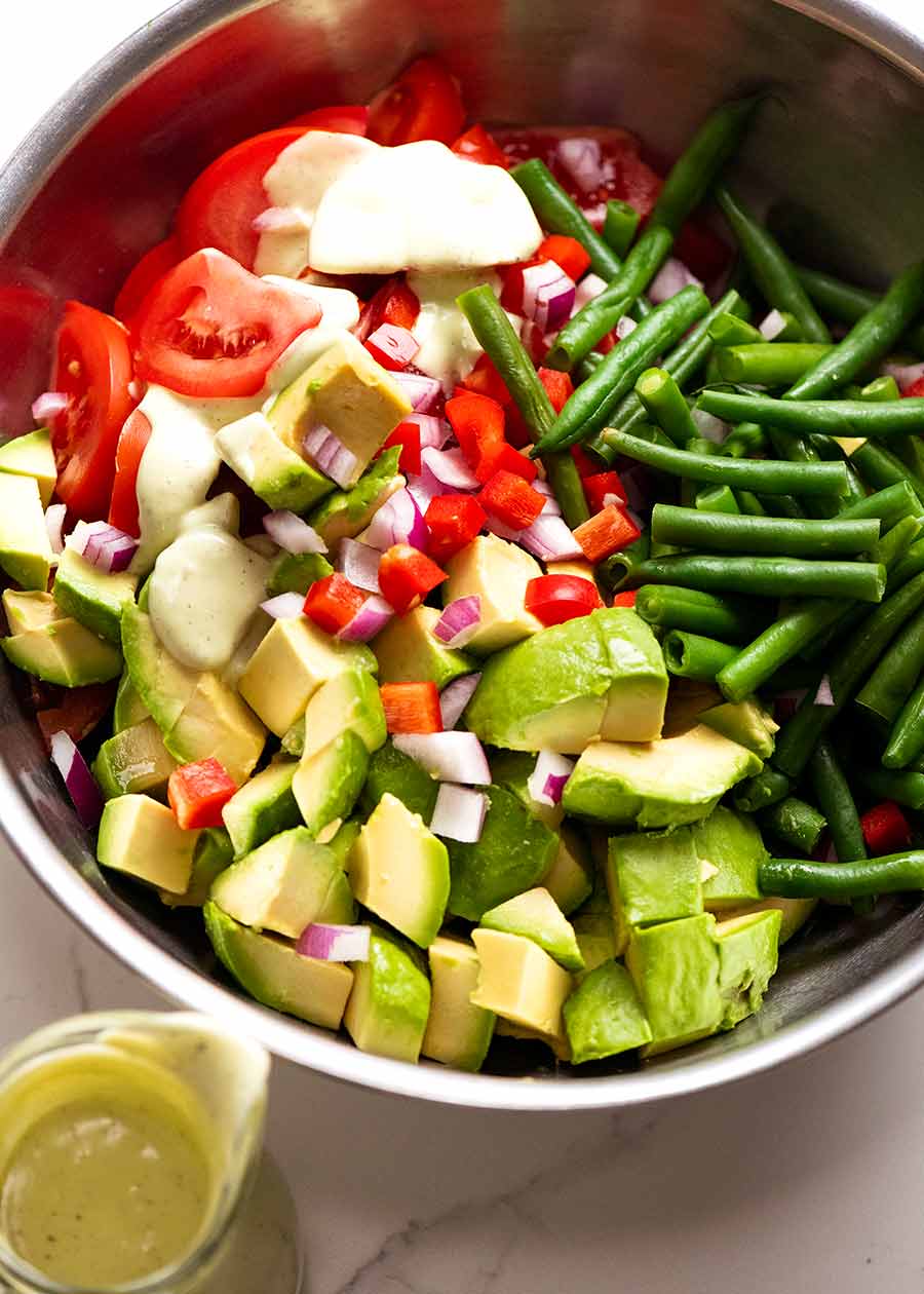 Bowl of Green Bean Avocado Salad with Avocado Dressing ready to be tossed