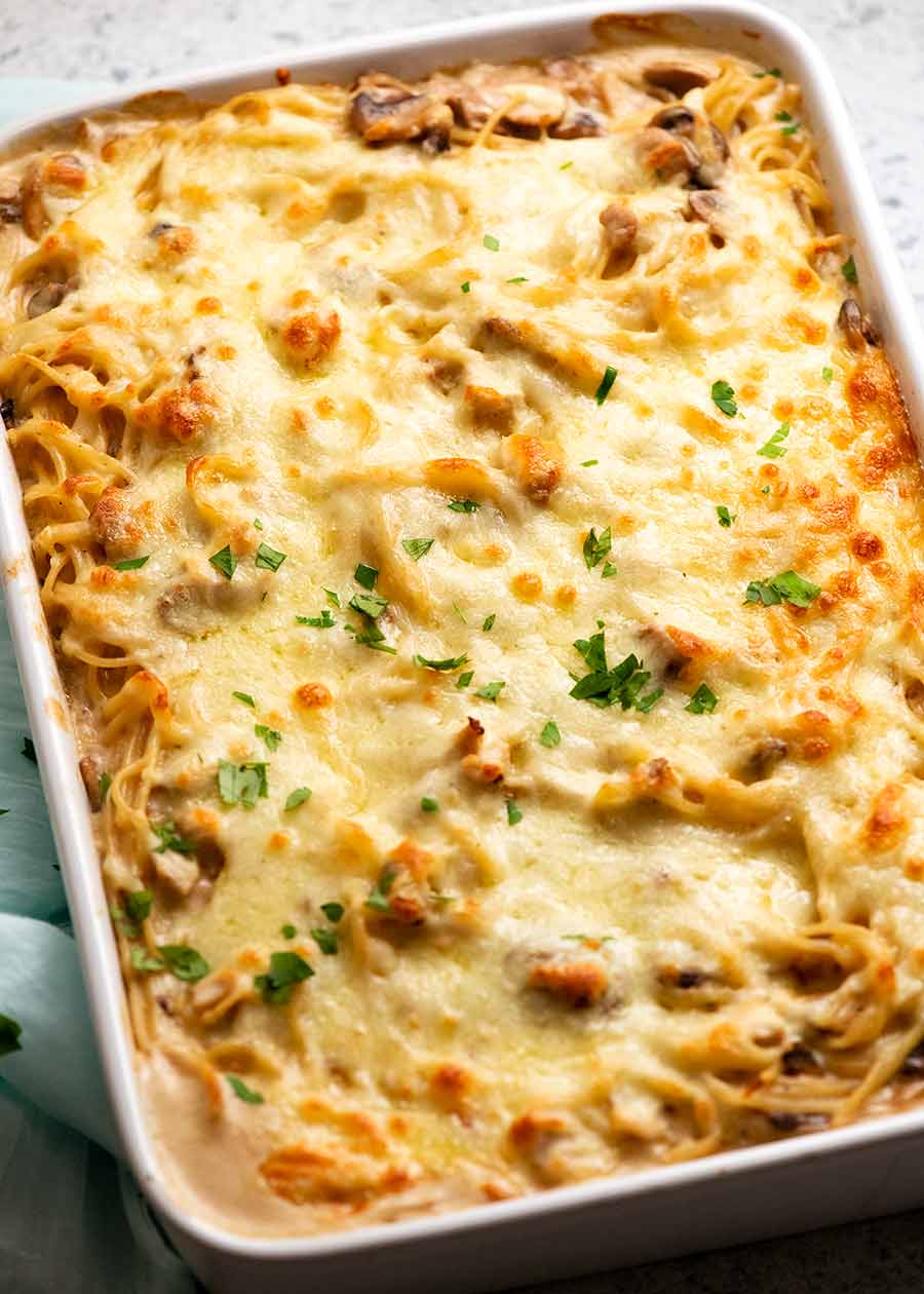 Pan of Chicken Tetrazzini - creamy chicken mushroom pasta bake, fresh out of the oven