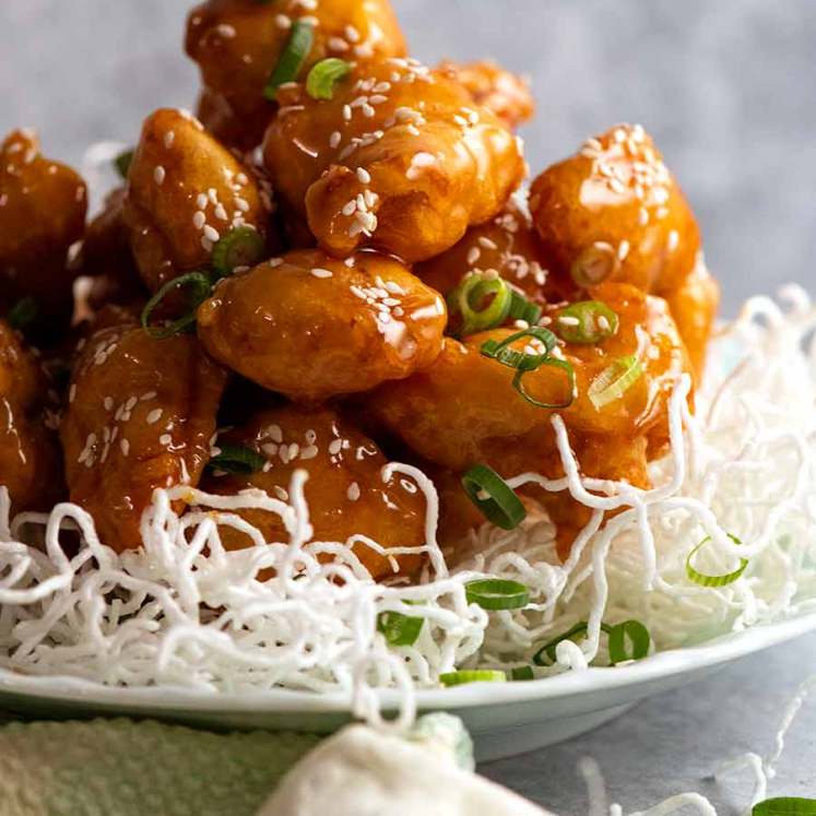 Pile of Honey Chicken on a plate - built to last, stay crispy