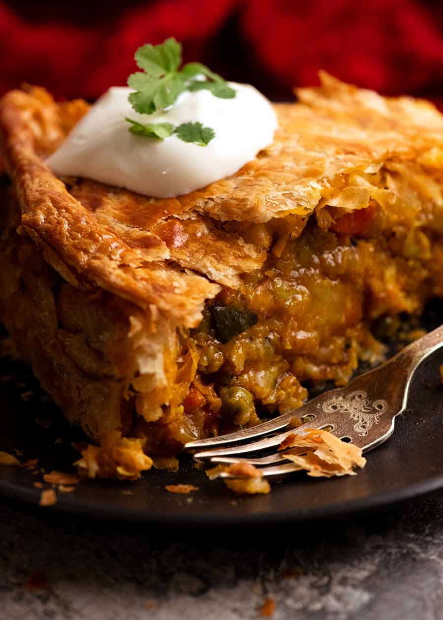 Showing filling of Vegetable Samosa Pie