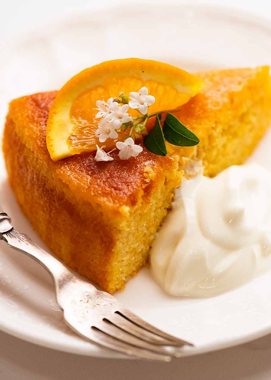 Close up of slice of Orange Cake, ready to be served