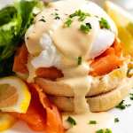 Eggs Benedict with smoked salmon on a plate, ready to be eaten
