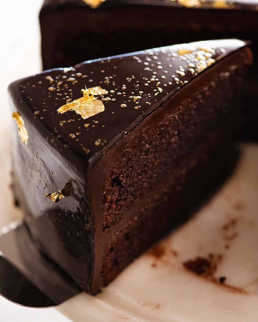 Close up of slice of Chocolate Mirror Glaze Cake