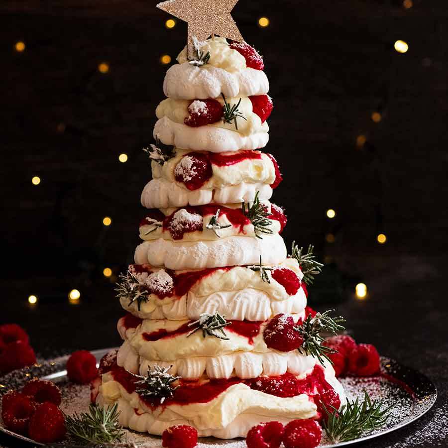 Pavlova Christmas Tree Dessert on a platter, ready to be served