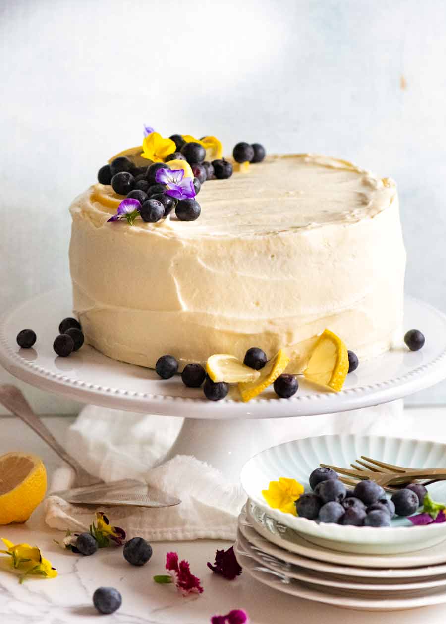Blueberry Cake with Lemon Cream Cheese Frosting on a cake stand, ready to be served