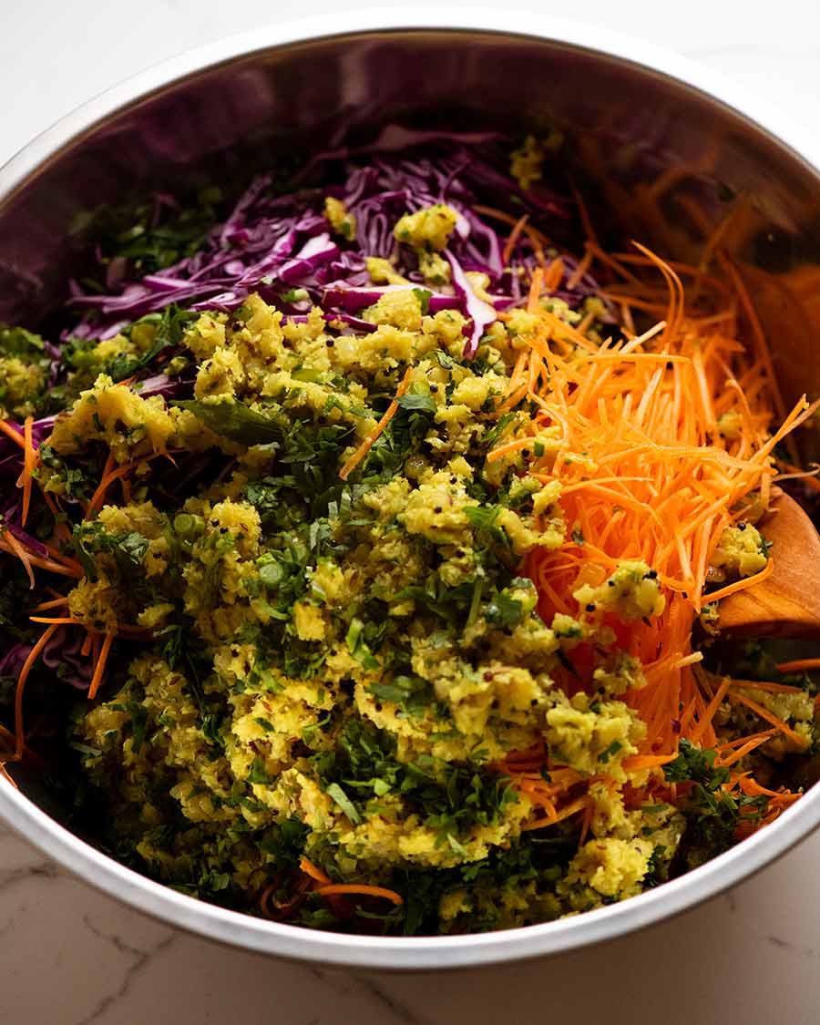 Indian Cabbage Carrot Salad in a bowl, ready to be tossed
