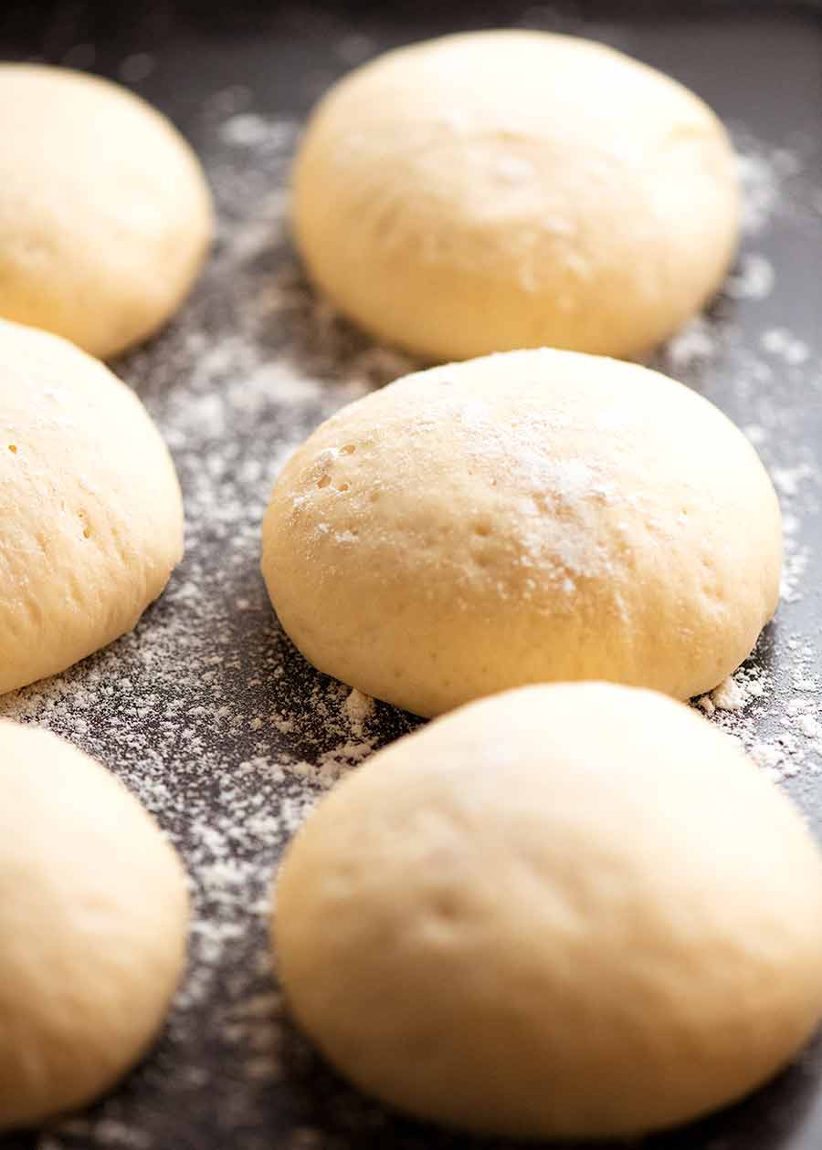 Balls of naan dough rising