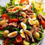 Close up of platter piled high with Salad Nicoise - French Tuna Salad