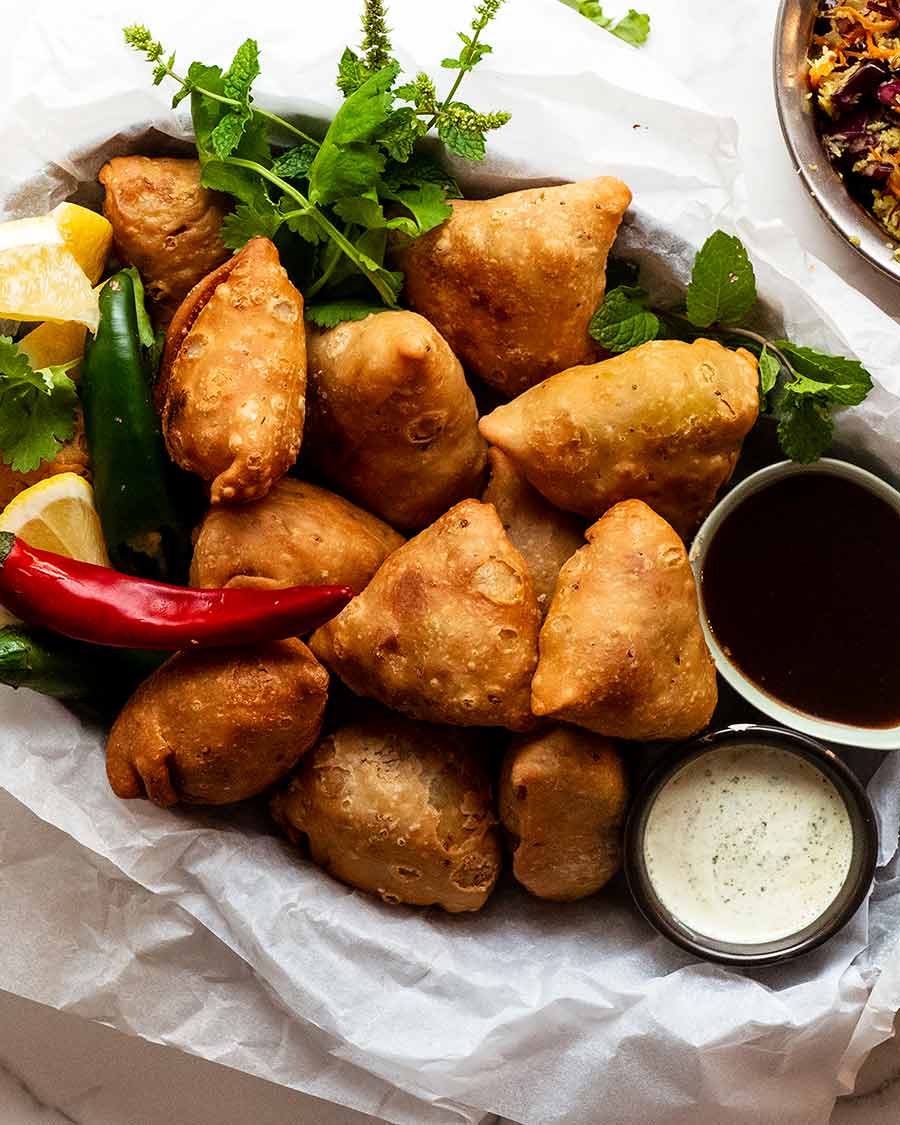 Pile of Samosas on a plate, ready to be served