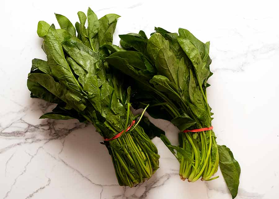 Two big bunches of English spinach for Spanakopita