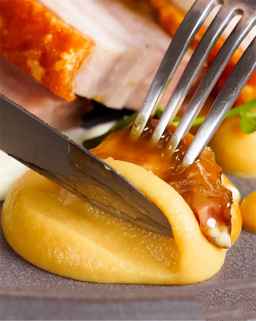 Eating Apple Sauce with Crispy Slow Cooked Pork Belly