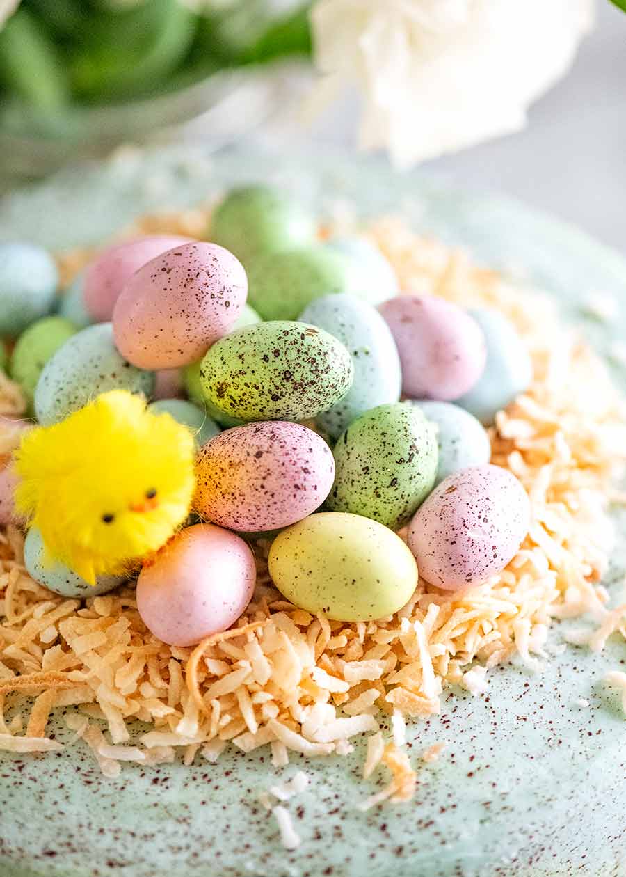 Pile of mini speckled Easter eggs on an Easter Cake - Easter Cake decorating idea