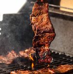 Korean BBQ Marinated Beef Short Ribs (Galbi) being cooked on the BBQ