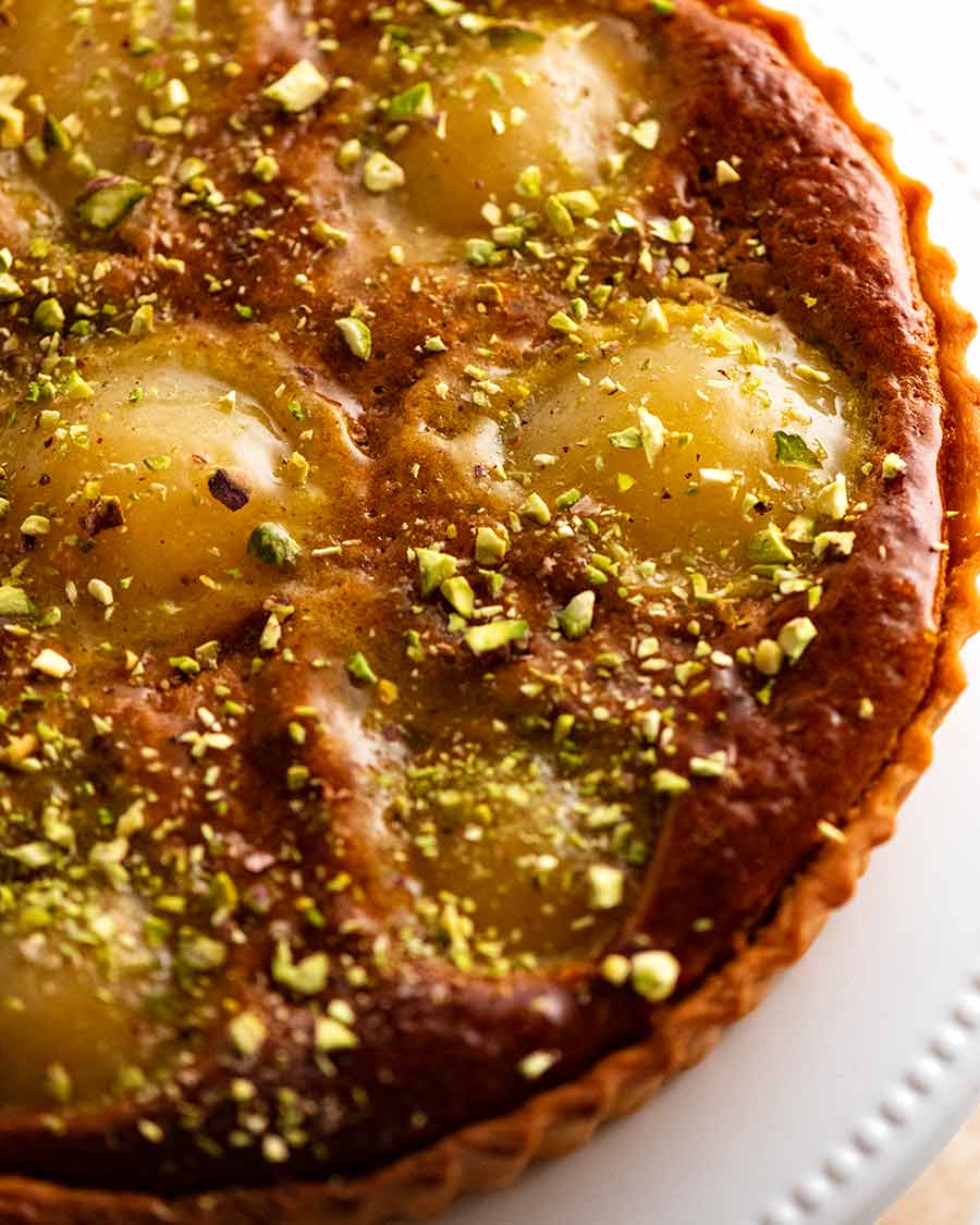 Close up photo of the top of Pistachio Pear Tart