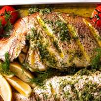 Freshly baked Whole Baked Fish with Garlic Butter Dill Sauce