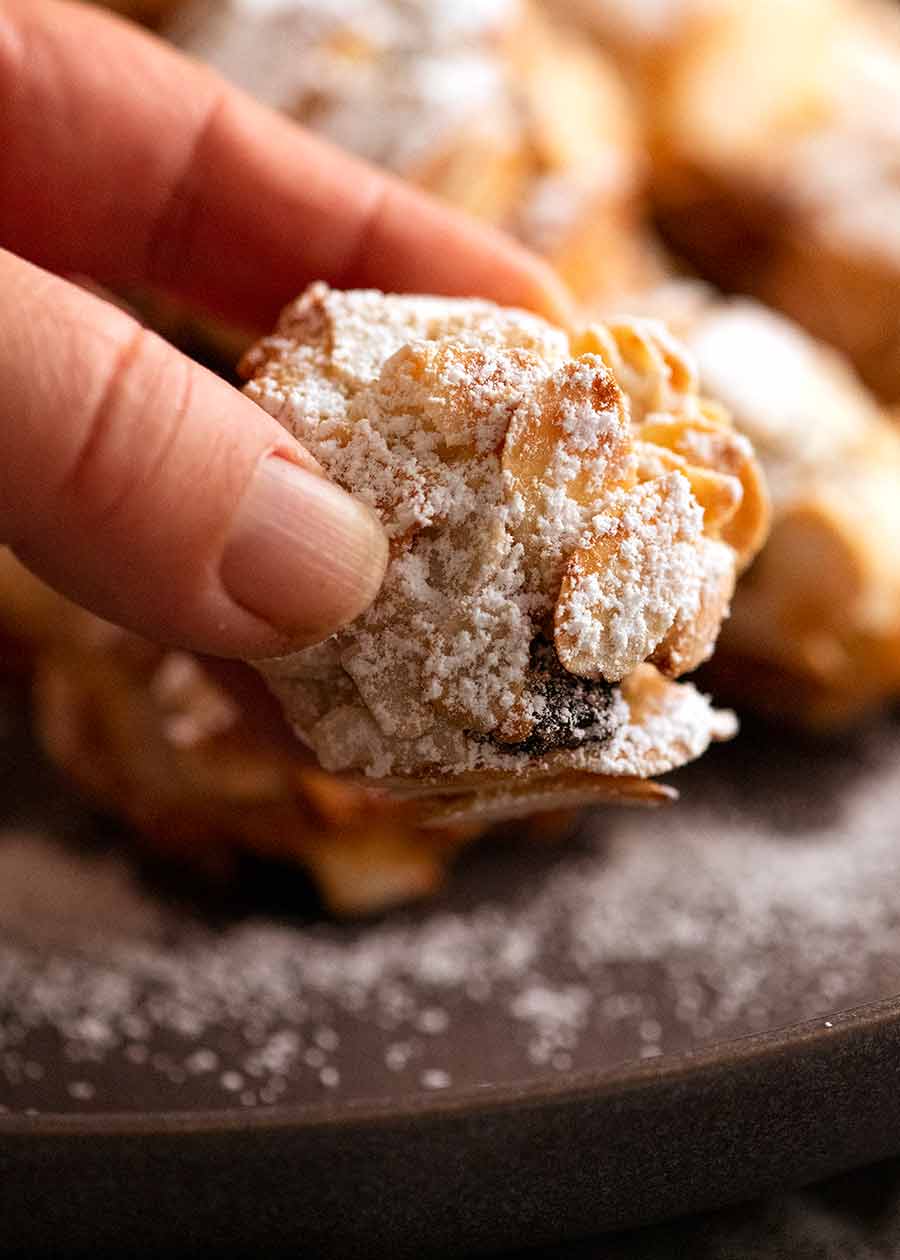 Close up photo of hand holding Italian Almond Cookie
