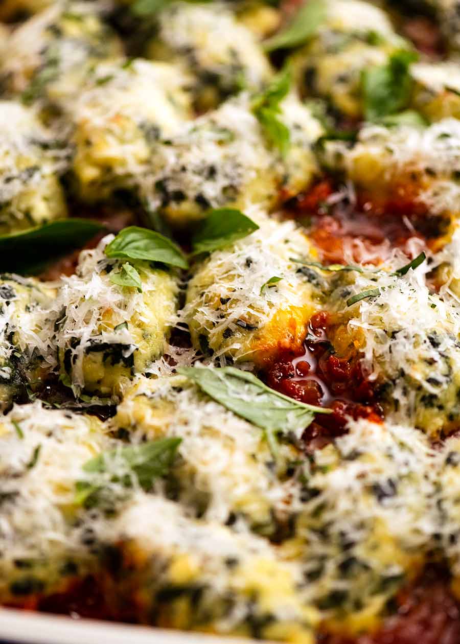 Close up photo of Malfatti - Italian Spinach Ricotta Dumplings, ready to be served