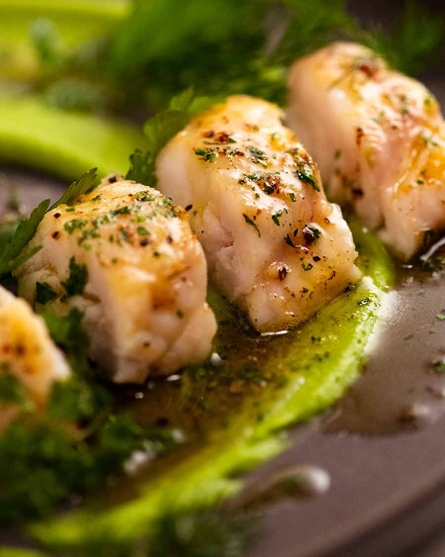 Close up photo of Monkfish recipe with pea puree and herb brown butter