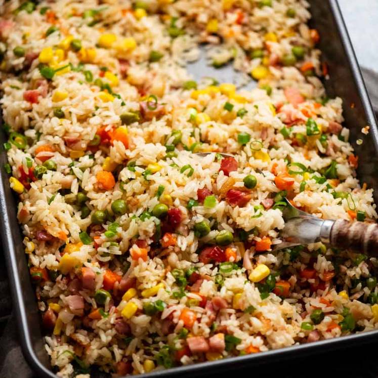 "Dump 'n Bake" Fried Rice in a baking pan, fresh out of the oven