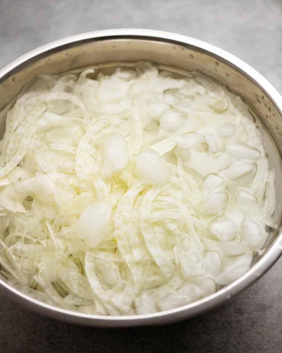Shaved fennel in ice water to keep it perky
