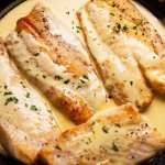 Freshly cooked fish with white wine sauce