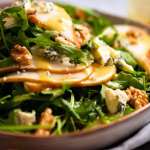 Close up photo of Pear Salad with Blue Cheese and Rocket Arugula