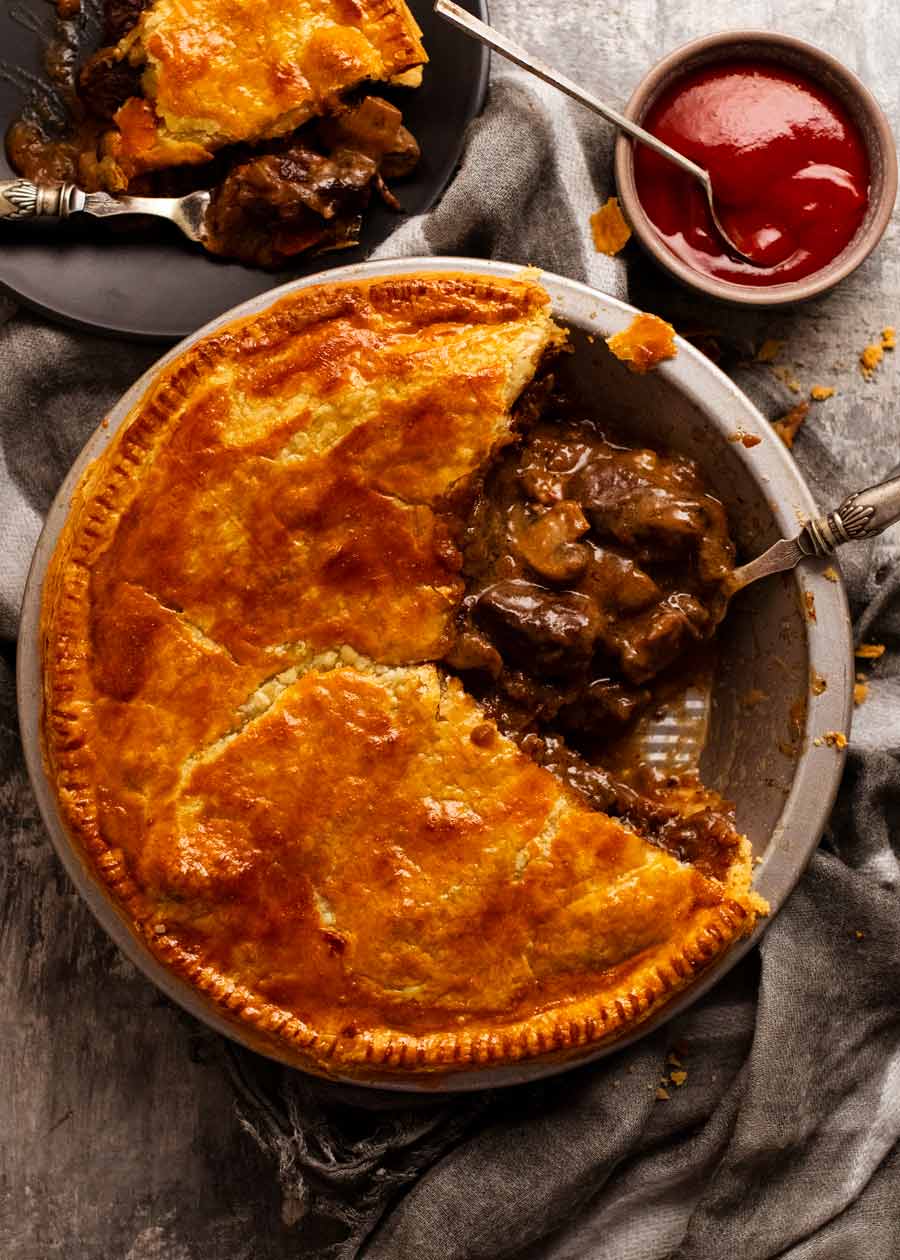 Family Meat Pie with slice taken out of it