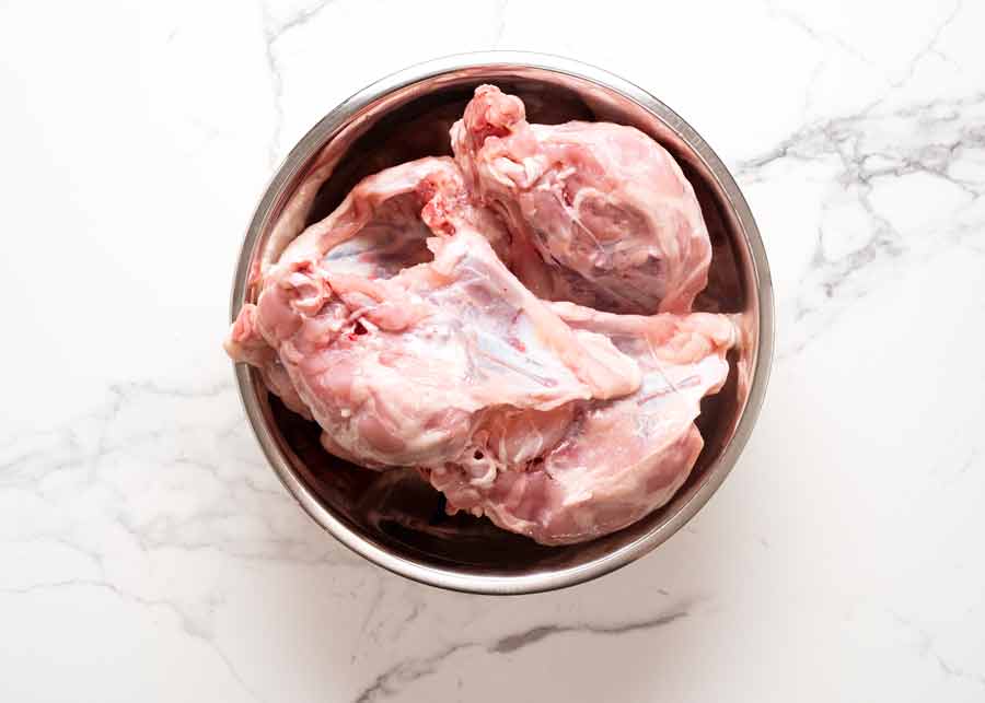 Raw chicken bones carcasses for Homemade chicken stock
