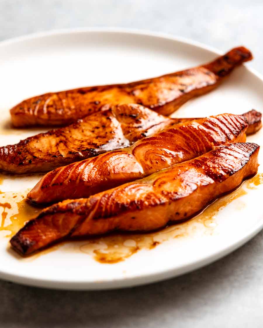 Teriyaki Salmon on a plate ready to toss into noodles