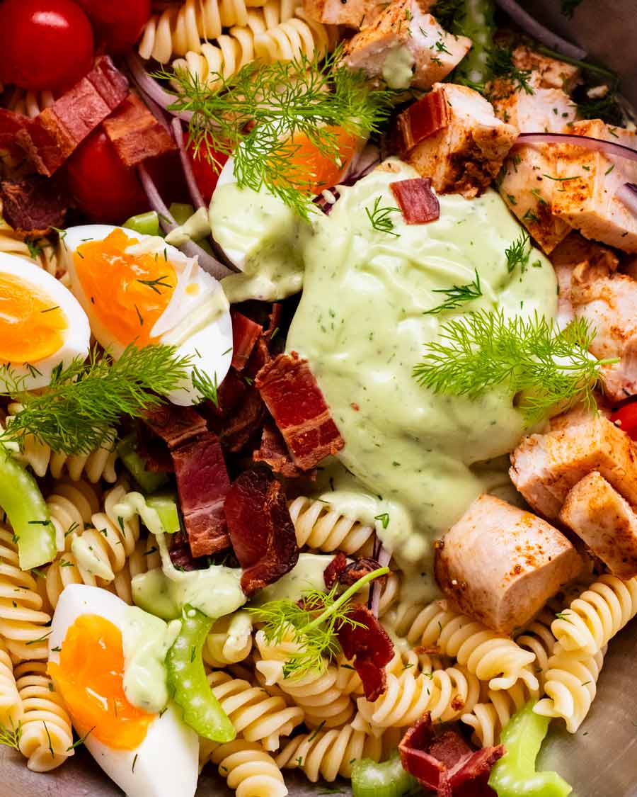 Close up photo of Pasta Salad with Avocado Ranch Dressing in a salad bowl