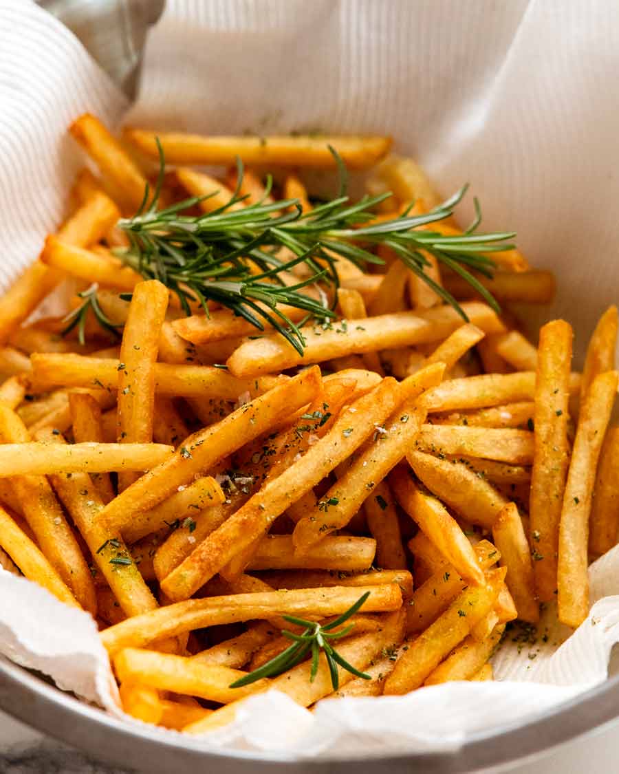 Bowl of freshly made French fries with rosemary salt