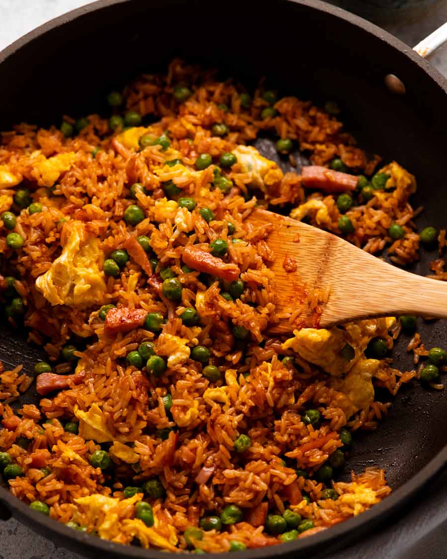 Freshly cooked Red Vietnamese Fried Rice in a skillet