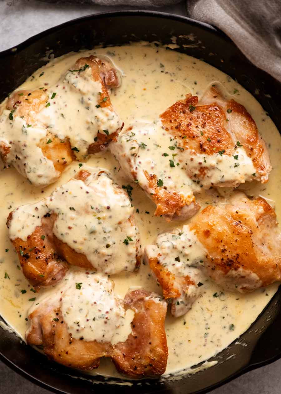 Freshly made Chicken with Creamy Mustard Sauce in a skillet ready to be served