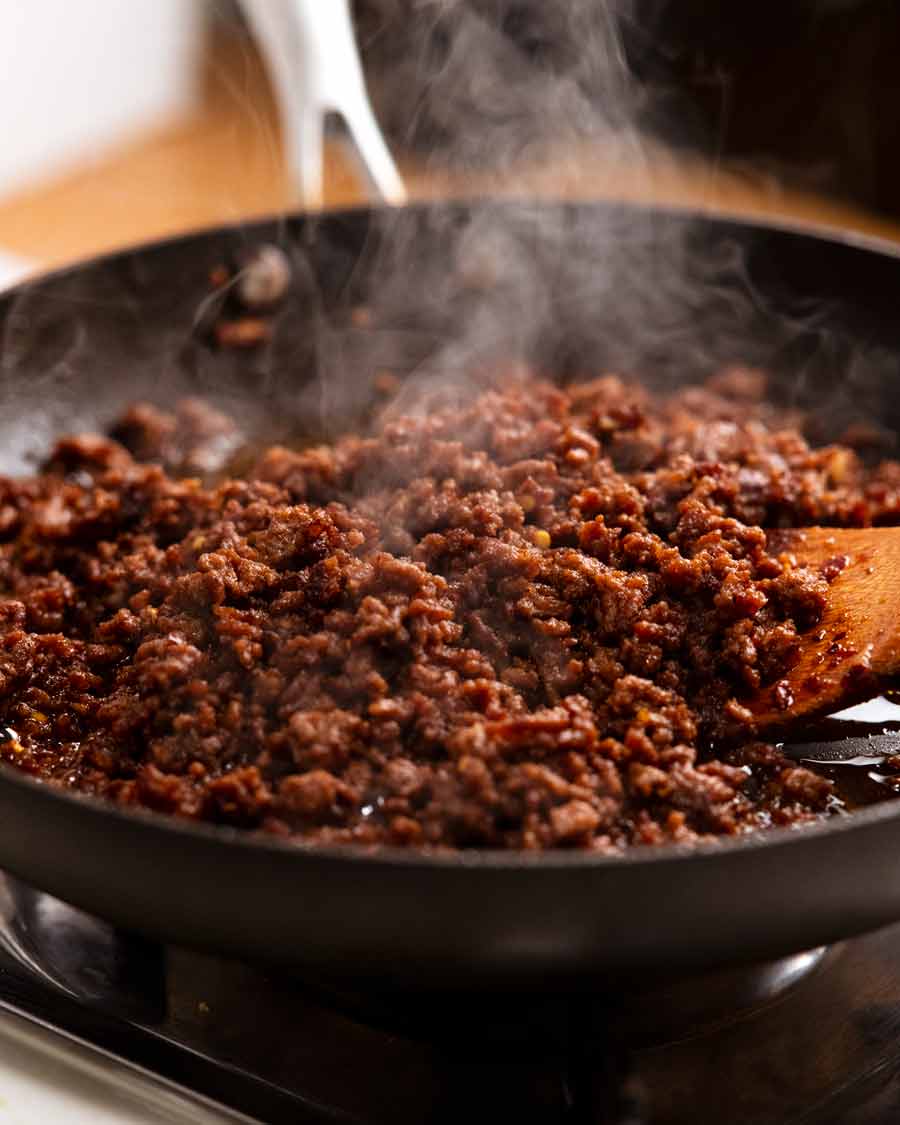 Steaming Firecracker beef in a frying pan
