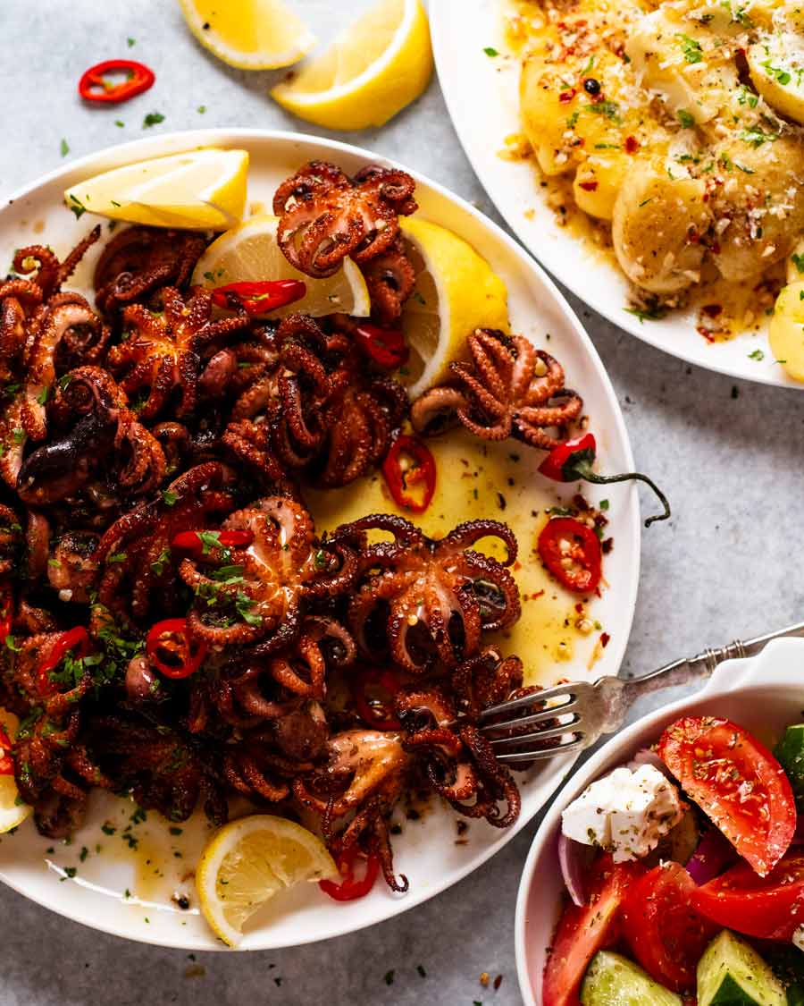 Crispy marinated baby octopus with potato side dish