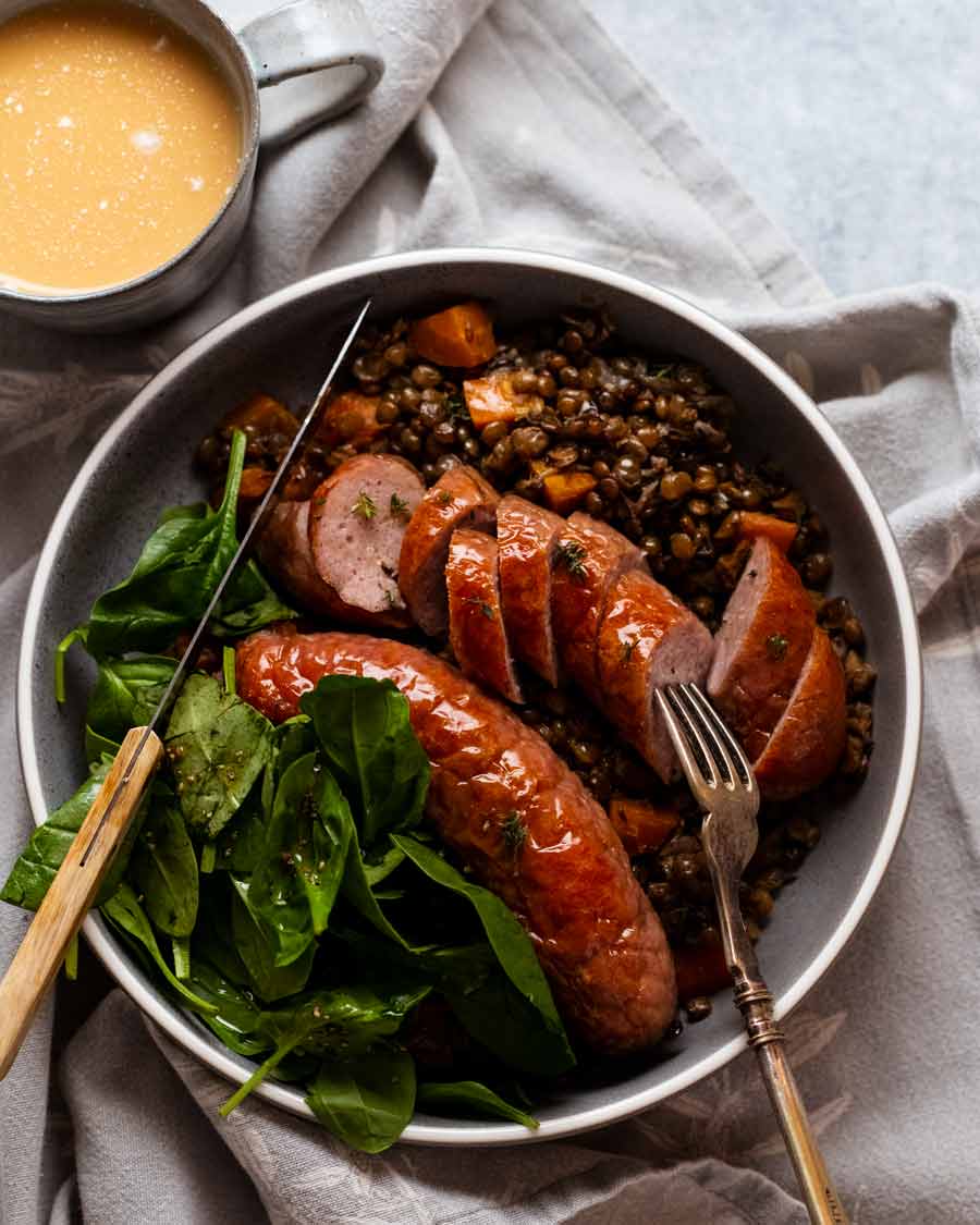 Dinner plate with One pan baked sausage and lentils