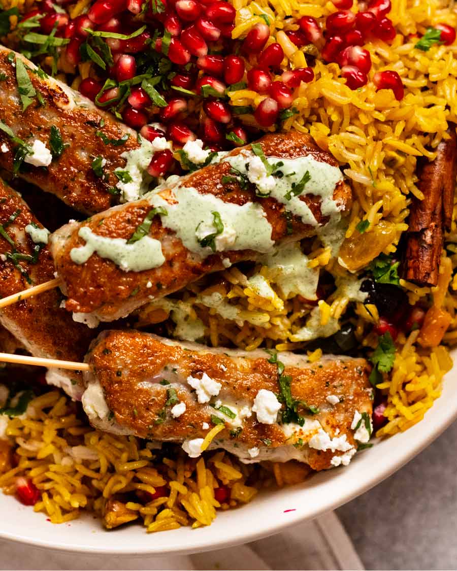 Jewelled rice with fish koftas on a platter ready to be served
