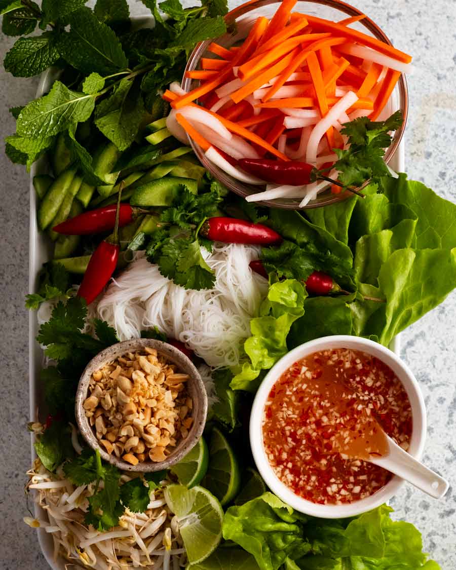 Vegetables and herb toppings for Vietnamese pork bowls