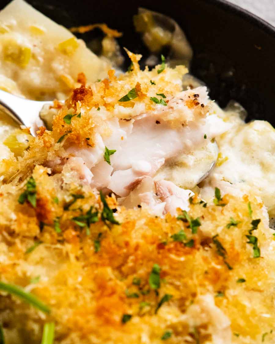 Close up showing succulent Creamy fish on potato gratin